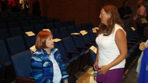 VBEA vice president Kelly Walker (right) speaks with School Board member Dottie Holtz during new teacher orientation (TOCLI). 